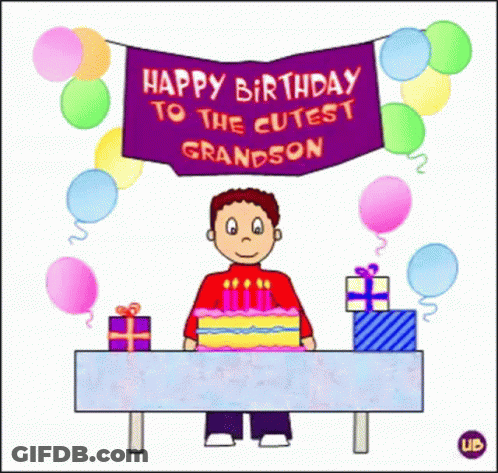 Boy Sitting At Table With Cake And Gifts GIF