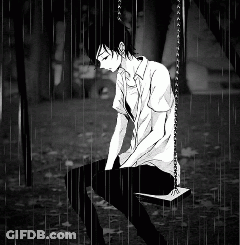 Boy Sitting On Swing In Rain GIF