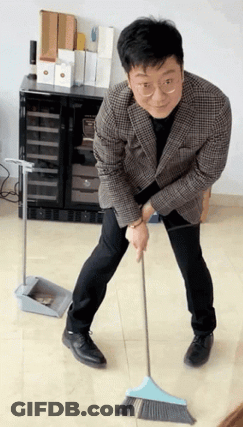Boy Slowly Sweep His Floor GIF