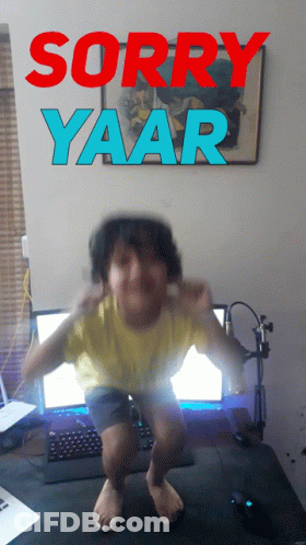 Boy Squatting In Front Of Computer Saying Sorry Yaar GIF
