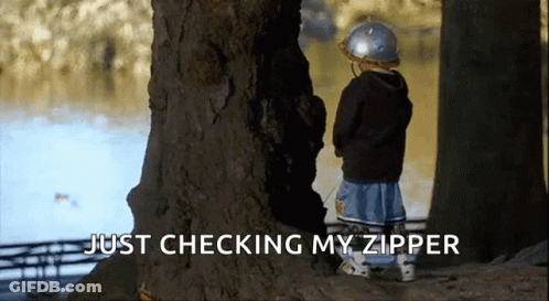 Boy Standing Next To Tree Saying Just Checking My Zipper GIF