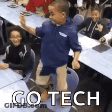 Boy Standing On Chair In Classroom GIF