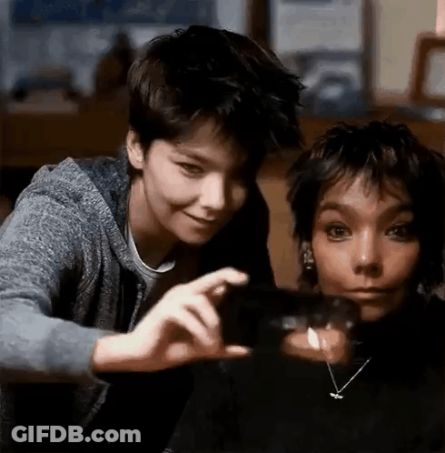 Boy Taking Picture Of Woman GIF