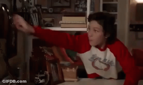 Boy Talking On Cell Phone GIF