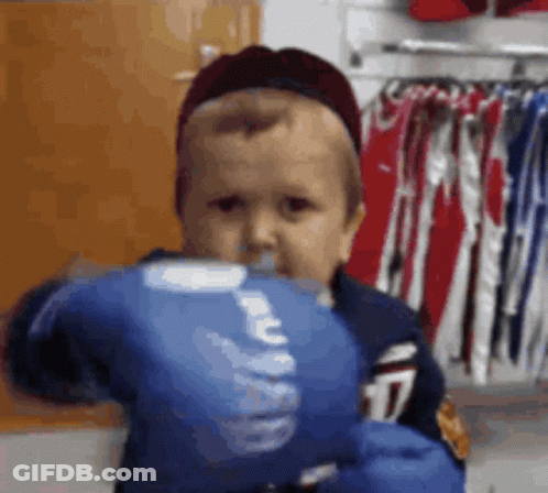 Boy Wearing Blue Boxing Glove 17 GIF
