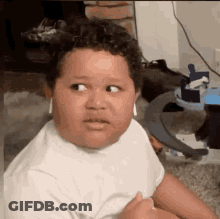 Boy Wearing Earbuds Making Funny Face GIF