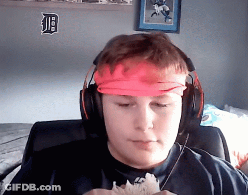 Boy Wearing Headphones And Tiger Sticker Headband GIF