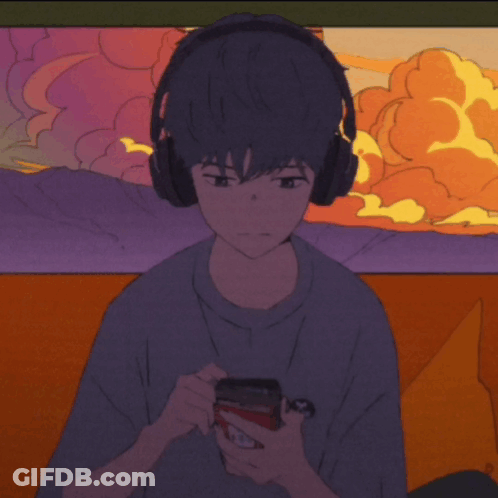 Boy Wearing Headphones Holding Cell Phone GIF