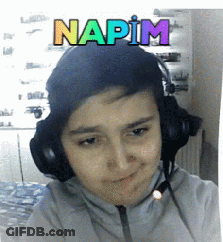 Boy Wearing Headphones With Napim GIF
