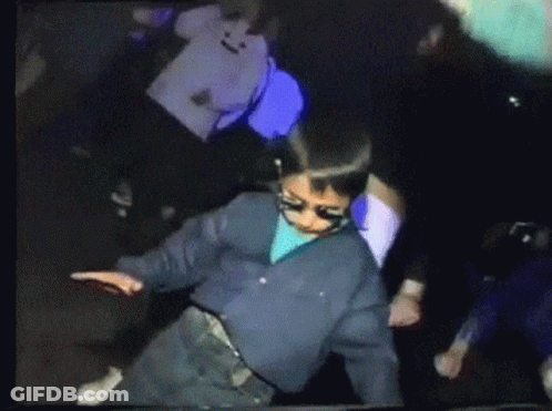 Boy Wearing Sunglasses Dancing In Crowd GIF