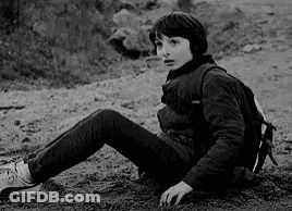 Boy With Backpack Sitting GIF