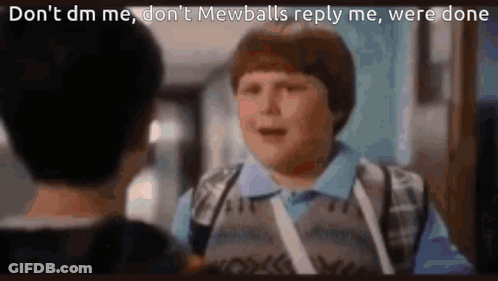 Boy With Backpack Talking To Another Boy In School Hallway GIF