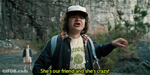 Boy With Backpack Wearing She's Our Friend And She's Crazy T-Shirt GIF