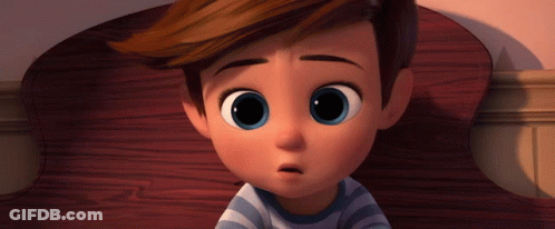 Boy With Big Blue Eyes Sitting GIF