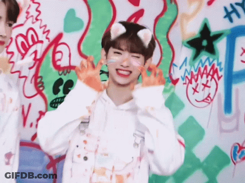 Boy With Cat Ear On Head Smiling GIF