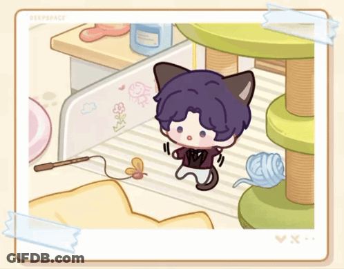 Boy With Cat Ears Playing With Yarn GIF