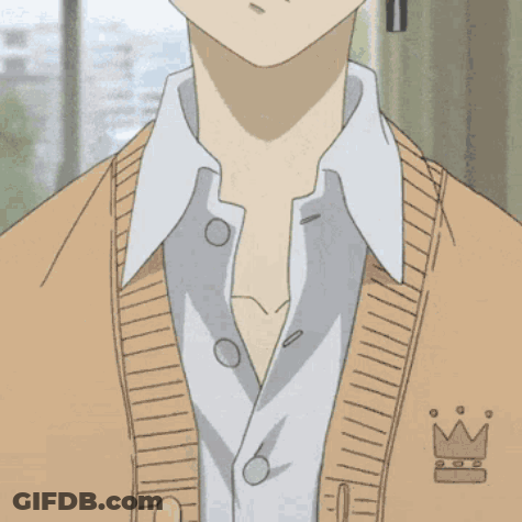 Boy With Cross Earring In Tan Sweater GIF