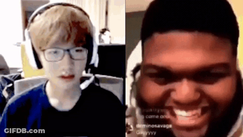 Boy With Glasses And Headphones Talking To Bearded Man GIF