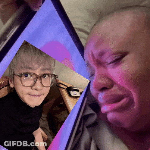 Boy With Glasses And Woman Crying On Tablet GIF