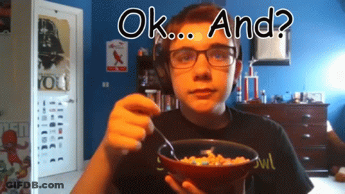 Boy With Glasses Eating Cereal Saying Ok GIF