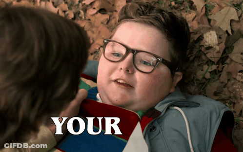 Boy With Glasses Laying Down Saying Your GIF