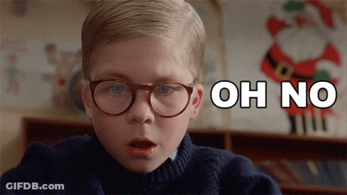 Boy With Glasses Says Oh No In Front Of Santa Claus GIF