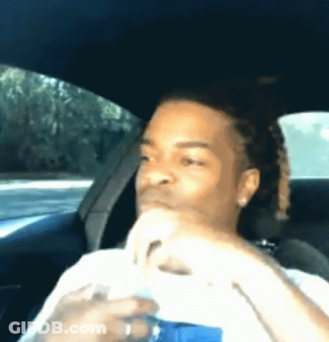 Boy With Headphones Looking At Camera GIF