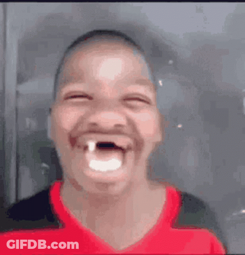 Boy With Missing Tooth Making Funny Face GIF