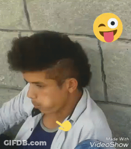 Boy With Mohawk And Smiley Face Behind GIF