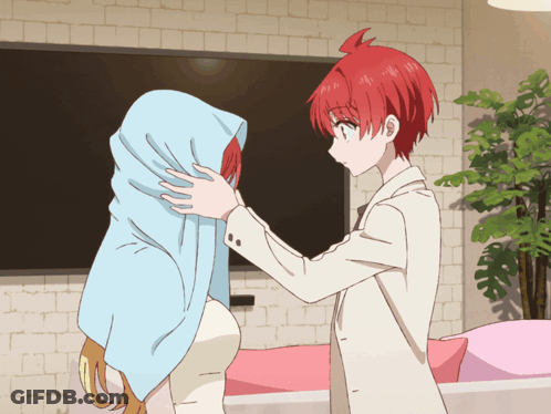 Boy With Red Hair Covering Girl With Blue Towel GIF