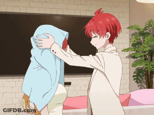 Boy With Red Hair Hugging Girl With Blue Towel GIF