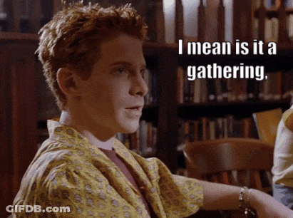Boy With Red Hair Says I Mean Is It A Gathering In Front Of Bookshelf GIF