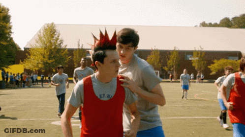 Boy With Red Mohawk In Grey Shirt Saying Get High GIF