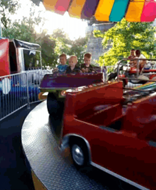 Boys On Theme Park Carousel GIF