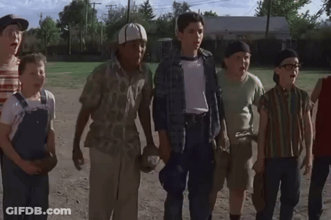Boys Running Across Dirt Field GIF
