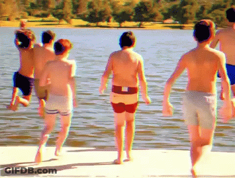 Boys Running Into Lake GIF