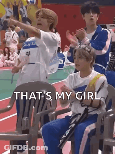 Boys Sitting On Basketball Court One Pointing GIF