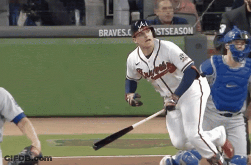 Braves Player Swinging Bat At Pitch GIF