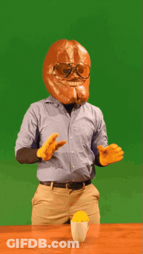 Bread Head Man With Glasses Next To Orange Juice GIF