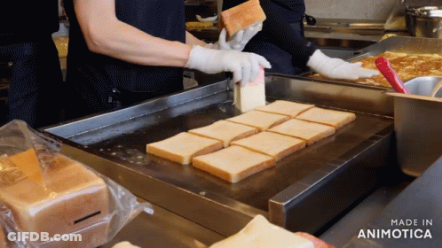 Bread Slices Cooking On Stove With Made In Animotica GIF