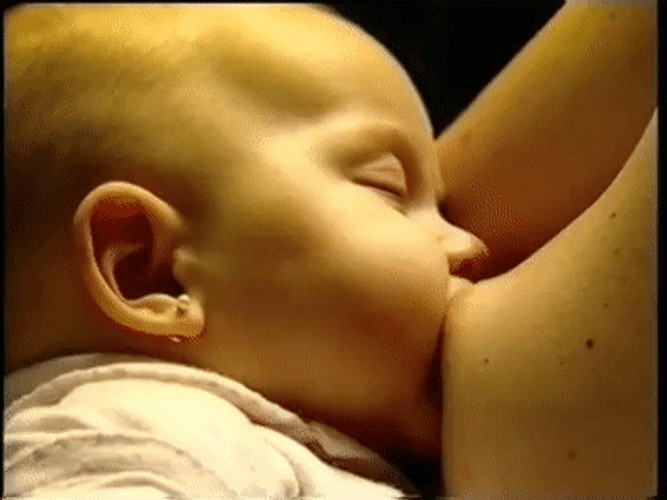 Breastfeeding Mother Of A Sleeping Baby GIF