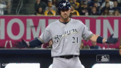 Brewers Baseball Player In Front Of Pink Sign GIF