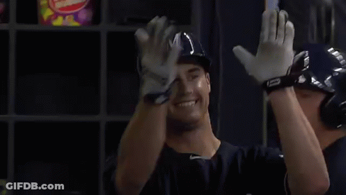 Brewers Player Arms Outstretched In Dugout GIF
