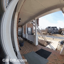 Brick House With Porch And Ladder GIF