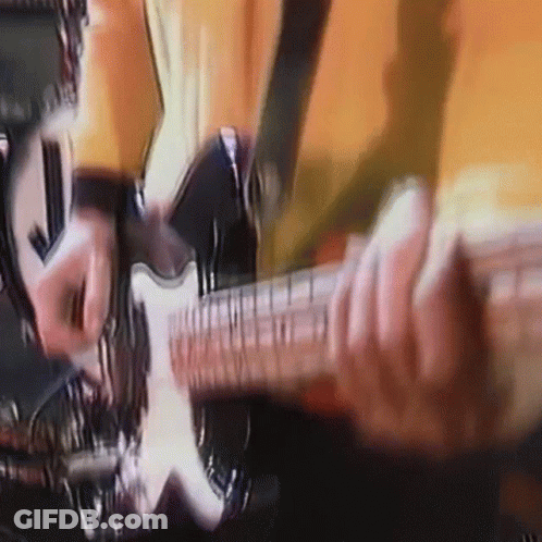 Brick Wall With Neon Bass Frenzy Sign GIF
