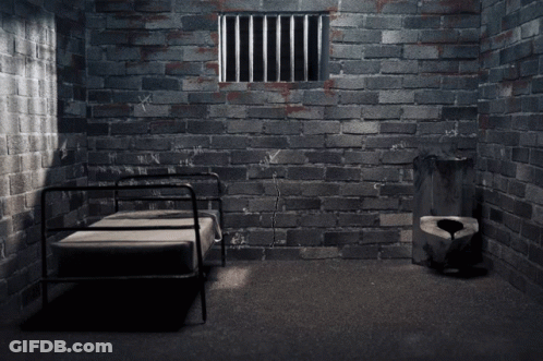 Brick Wall With Prison Cell Hole GIF