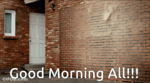 Brick Wall With White Door Saying Good Morning All GIF
