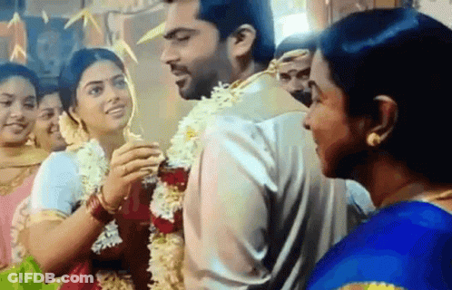 Bride And Groom At Wedding With Crowd GIF