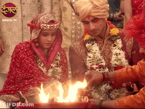 Bride And Groom Before Fire With Dangal TV Logo GIF