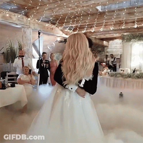 Bride And Groom Dancing In Front Of Crowd GIF